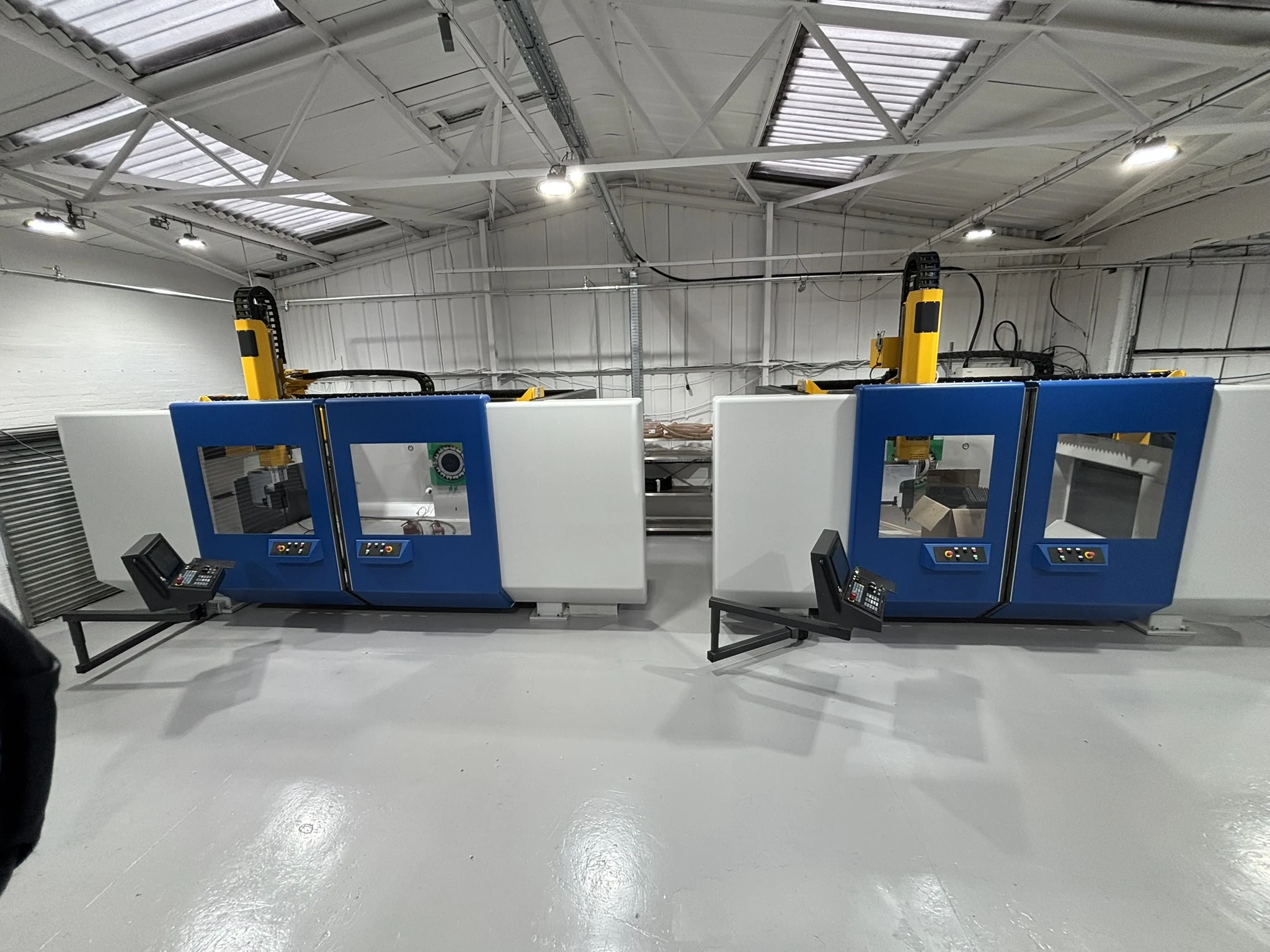 Two Geiss CNC trimming machines in the factory
