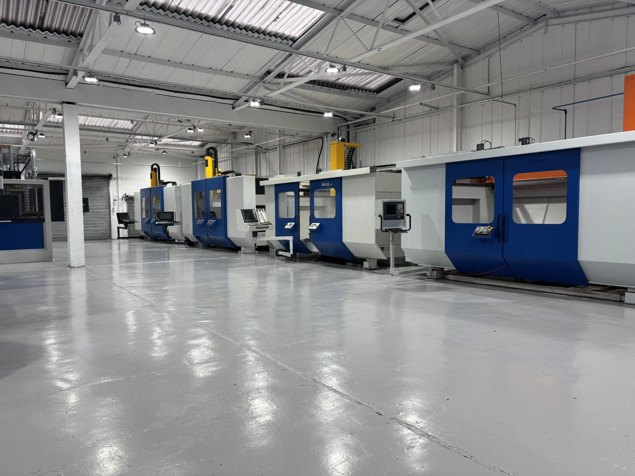 The Geiss CNC trimming machine row at YC Plastics
